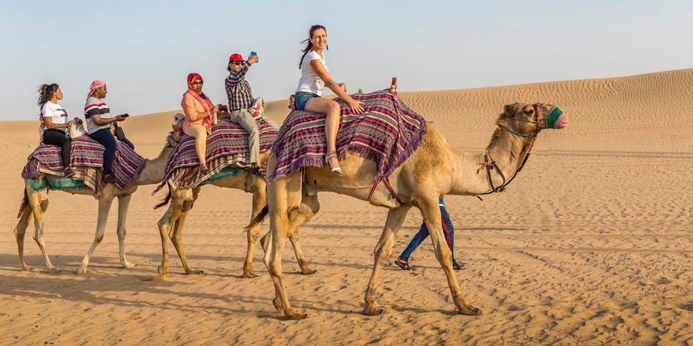 Feel the magic of Dubai's desert with a traditional camel ride in Dubai. Ride across golden dunes and make unforgettable memories.